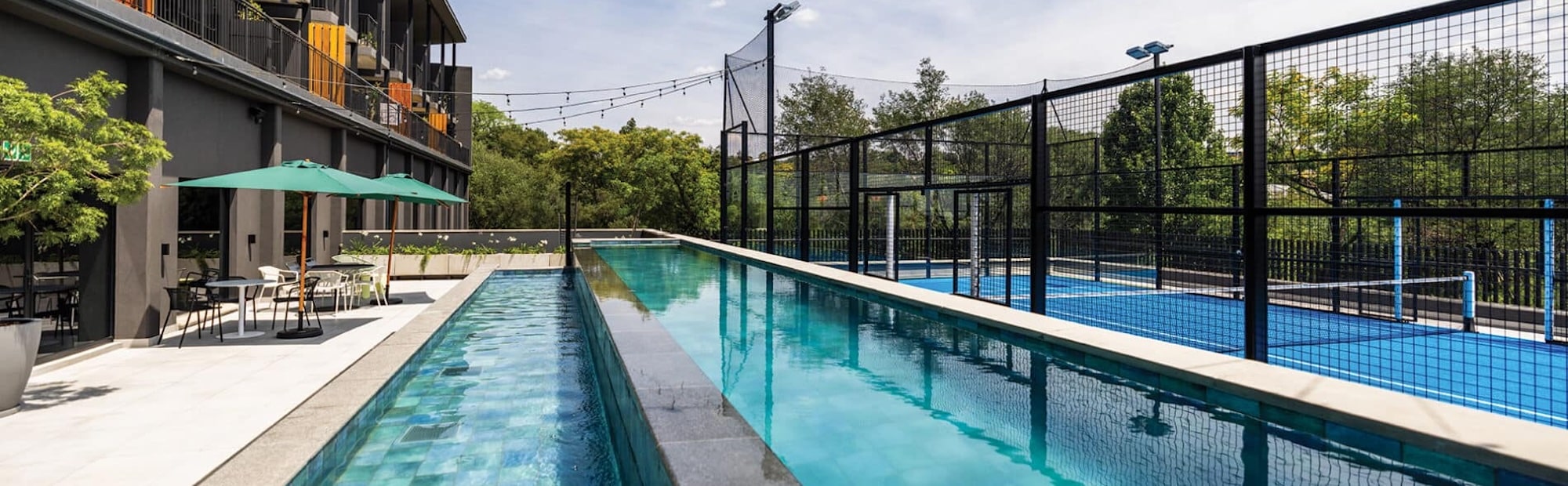 Emerald-Outdoor-Pool-With-Padel-Court-banner
